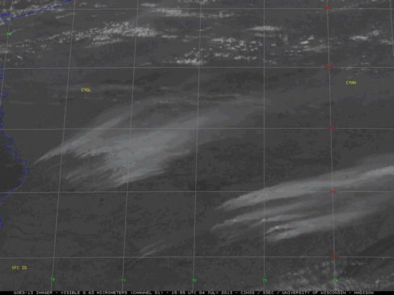 1-km resolution GOES-13 0.63 µm visible channel images showed several dense plumes of smoke, along with the development of a pyrocumulonimbus (pyroCb) cloud  after about 21:55 UTC on 04 July 2013. A well-defined pyroCb anvil casting a shadow on the smoke layer below is seen on the 23:02 UTC image.