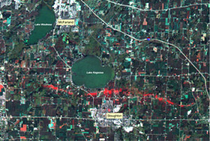 Change detection techniques can help map damage areas following severe weather. This image shows, from left to right, the ground trace of an F3 tornado that touched down August 18, 2005 on the north side of Stoughton, Wisconsin. Researchers at the Environmental Remote Sensing Center at the University of Wisconsin-Madison produced this image for the Wisconsin Emergency Management using the blue and green spectral bands of a Landsat 5 TM image acquired one month before the storm and the red band of a Terra ASTER image acquired 10 days after the storm. Photo: courtesy UW-Madison Environmental Remote Sensing Center; image processing by Peter Wolter; cartography by Sam Batzli.