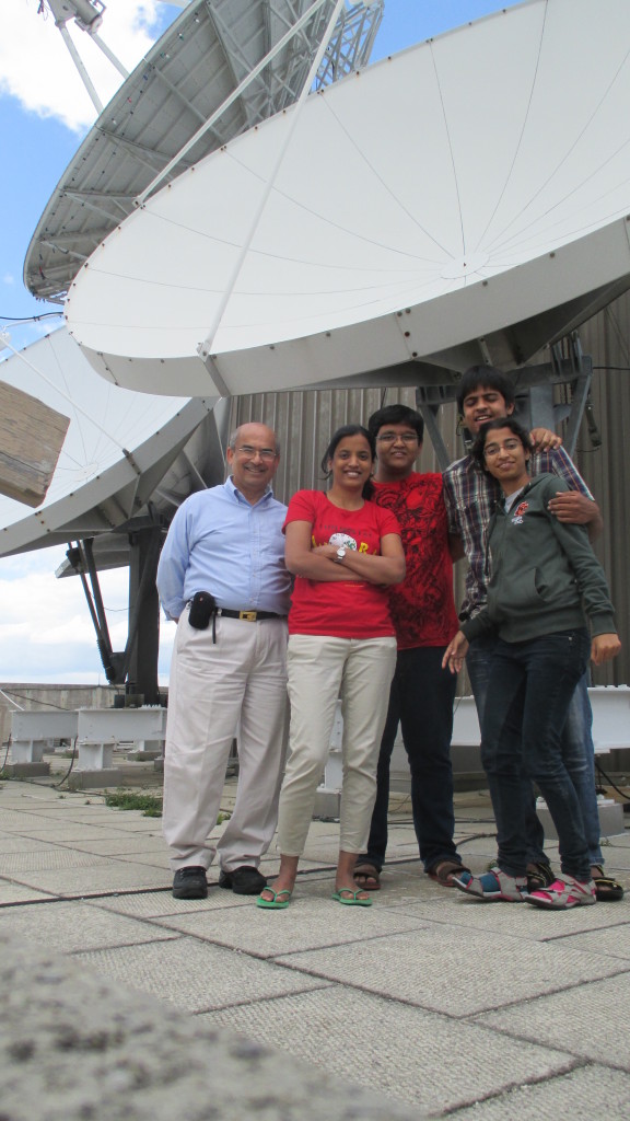 Four students were selected to study with Sanjay Limaye through the S.N. Bose Scholars Program, out of nine students placed at UW-Madison. The students pose with Limaye (far left) on the AOSS building roof.
