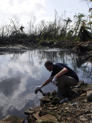 Hubbard takes water sample in San Juan